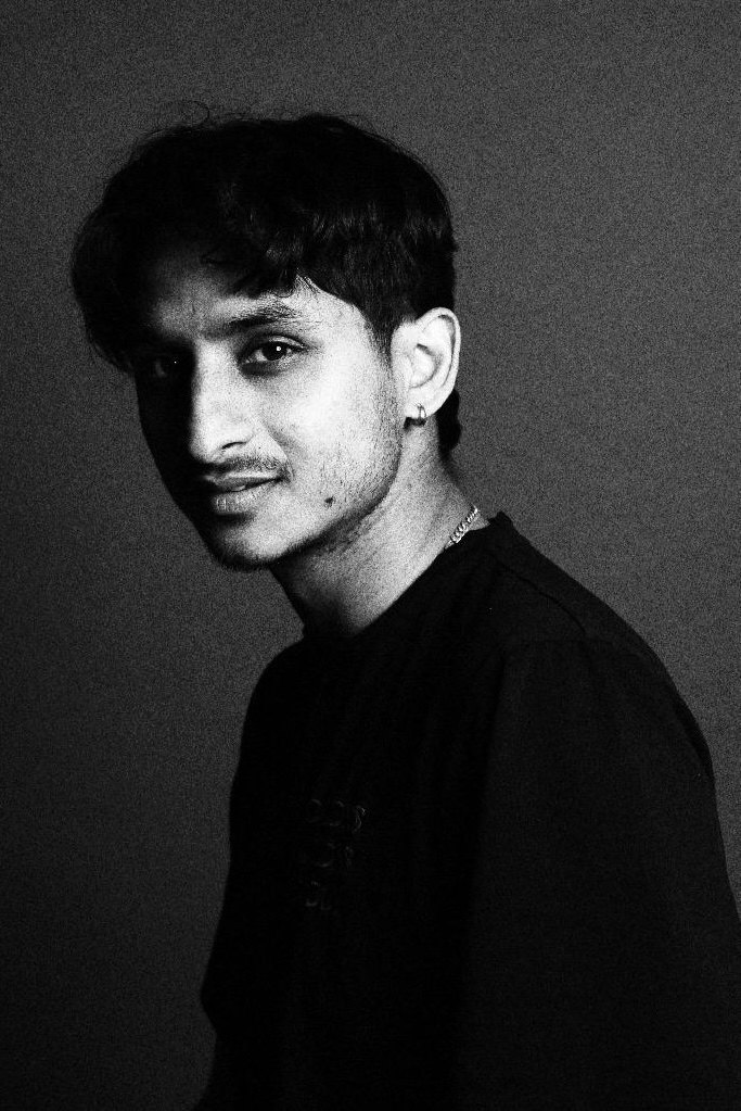 Anubhav Kaushish, founder of V14 Films, black and white portrait